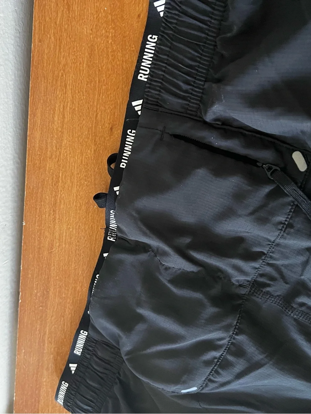 adidas Black Athletic Shorts with White Three-Stripe Accents 5” large